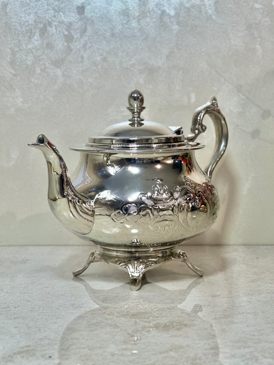 Théière élégance d'argent – Artisanat haut de gamme