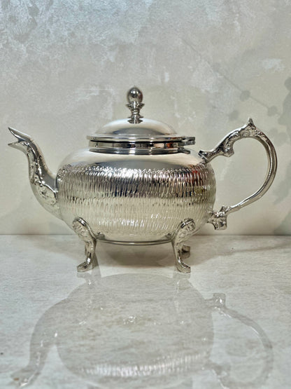 Théière élégance d'argent – Artisanat haut de gamme